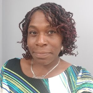Staff_Nia Headshot-final